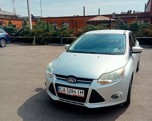 Серый Форд Фокус, объемом двигателя 2 л и пробегом 249 тыс. км за 7500 $, фото 1 на Automoto.ua