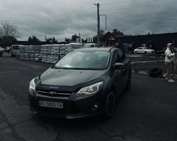 Форд Фокус 2014 в Белой Церкве на Automoto.ua Серый Форд Фокус, объемом двигателя 2 л и пробегом 151 тыс. км за 5999 $, фото 16 на Automoto.ua