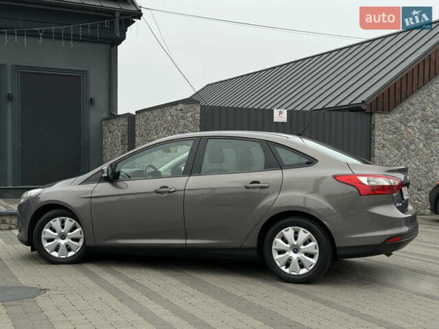 Серый Форд Фокус, объемом двигателя 1 л и пробегом 145 тыс. км за 6350 $, фото 12 на Automoto.ua