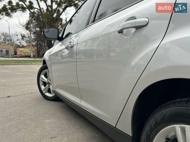 Сірий Форд Фокус, об'ємом двигуна 2 л та пробігом 234 тис. км за 6600 $, фото 16 на Automoto.ua