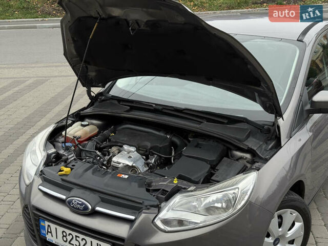 Серый Форд Фокус, объемом двигателя 1 л и пробегом 145 тыс. км за 6350 $, фото 30 на Automoto.ua
