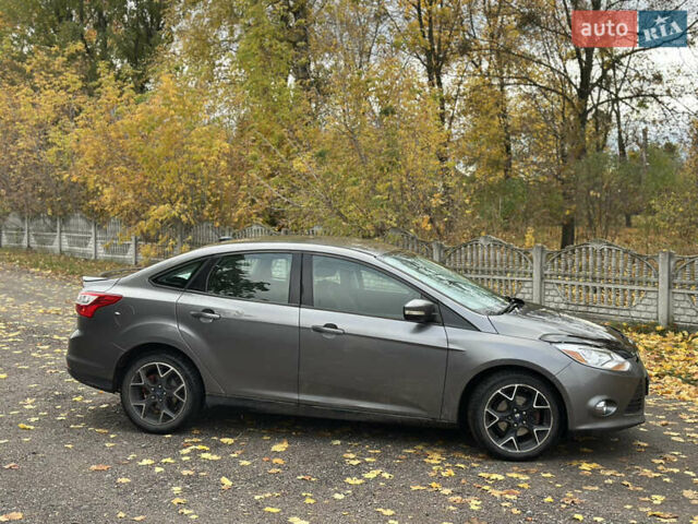 Форд Фокус 2014 в Белой Церкве на Automoto.ua Серый Форд Фокус, объемом двигателя 2 л и пробегом 151 тыс. км за 5999 $, фото 6 на Automoto.ua