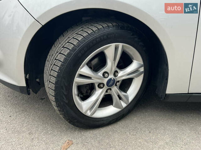Сірий Форд Фокус, об'ємом двигуна 2 л та пробігом 234 тис. км за 6600 $, фото 17 на Automoto.ua