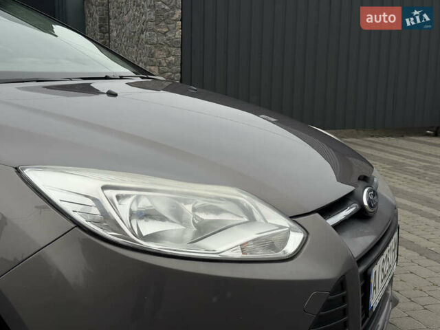 Серый Форд Фокус, объемом двигателя 1 л и пробегом 145 тыс. км за 6350 $, фото 20 на Automoto.ua