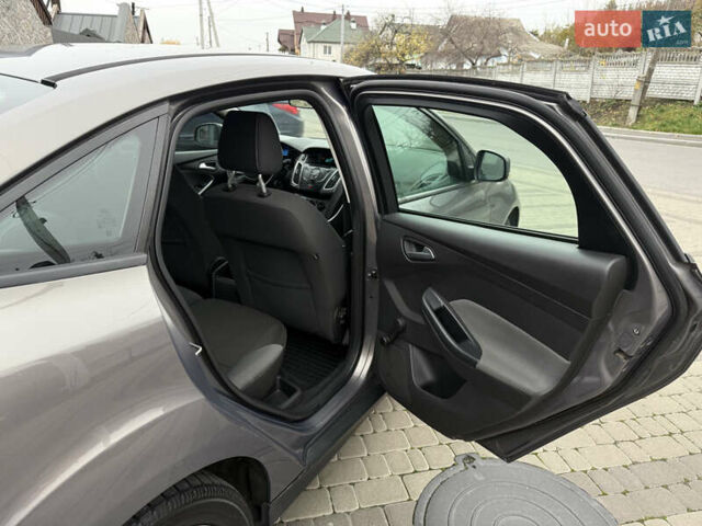 Серый Форд Фокус, объемом двигателя 1 л и пробегом 145 тыс. км за 6350 $, фото 34 на Automoto.ua