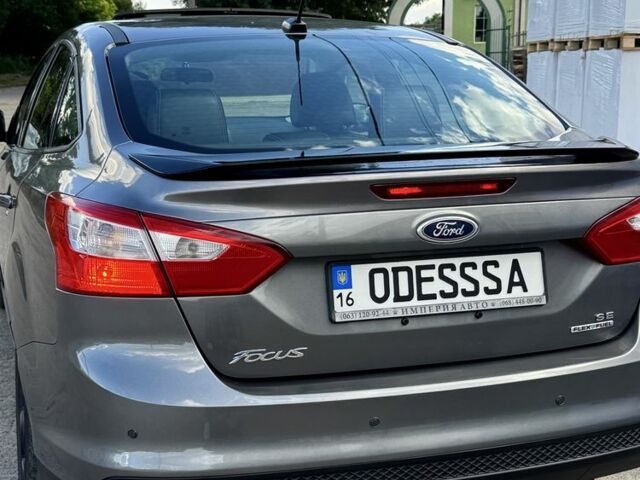 Сірий Форд Фокус, об'ємом двигуна 2 л та пробігом 147 тис. км за 9301 $, фото 3 на Automoto.ua