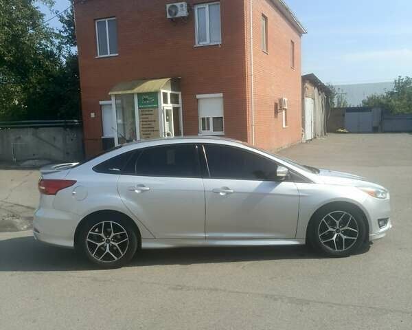 Сірий Форд Фокус, об'ємом двигуна 2 л та пробігом 107 тис. км за 9000 $, фото 5 на Automoto.ua