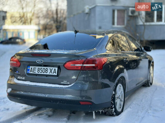 Сірий Форд Фокус, об'ємом двигуна 2 л та пробігом 140 тис. км за 8999 $, фото 3 на Automoto.ua