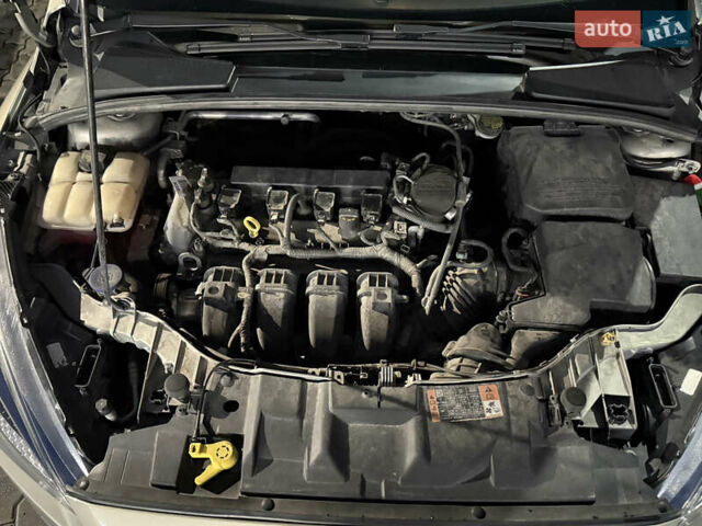Серый Форд Фокус, объемом двигателя 2.01 л и пробегом 157 тыс. км за 7777 $, фото 18 на Automoto.ua