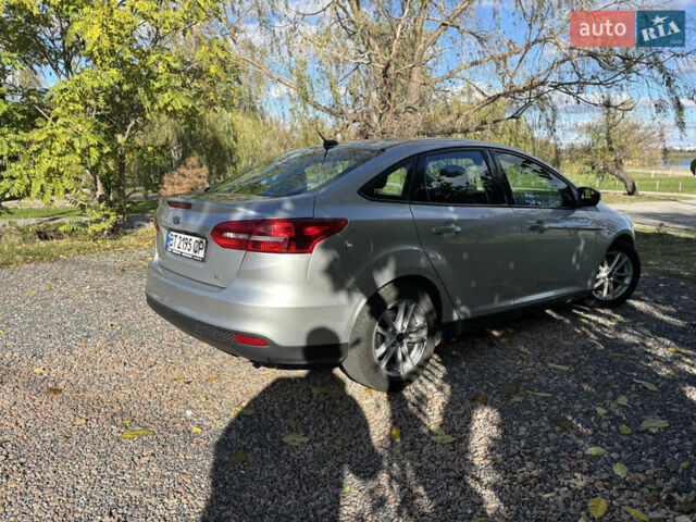 Сірий Форд Фокус, об'ємом двигуна 2 л та пробігом 80 тис. км за 9200 $, фото 6 на Automoto.ua