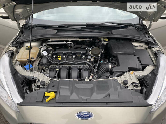 Сірий Форд Фокус, об'ємом двигуна 2 л та пробігом 87 тис. км за 7999 $, фото 17 на Automoto.ua