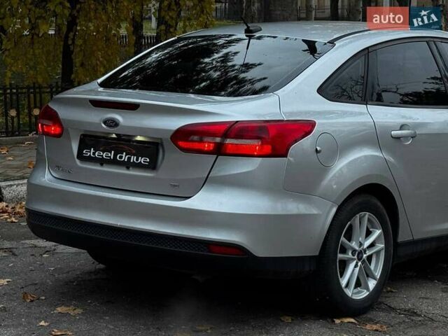 Сірий Форд Фокус, об'ємом двигуна 2 л та пробігом 139 тис. км за 7999 $, фото 7 на Automoto.ua