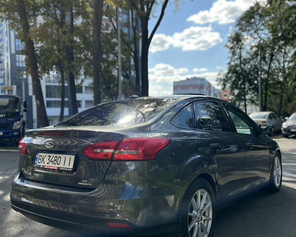 Сірий Форд Фокус, об'ємом двигуна 2 л та пробігом 122 тис. км за 7750 $, фото 4 на Automoto.ua