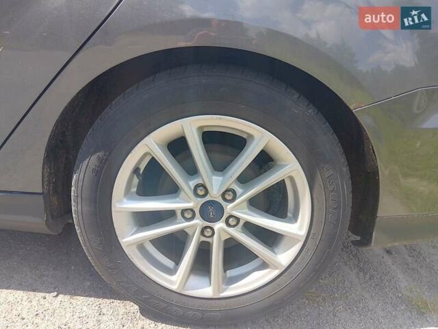 Серый Форд Фокус, объемом двигателя 2.01 л и пробегом 220 тыс. км за 6799 $, фото 11 на Automoto.ua