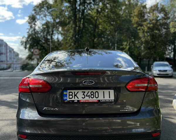 Сірий Форд Фокус, об'ємом двигуна 2 л та пробігом 122 тис. км за 7750 $, фото 5 на Automoto.ua