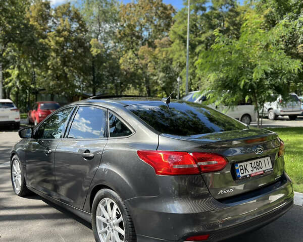 Сірий Форд Фокус, об'ємом двигуна 2 л та пробігом 122 тис. км за 7750 $, фото 6 на Automoto.ua