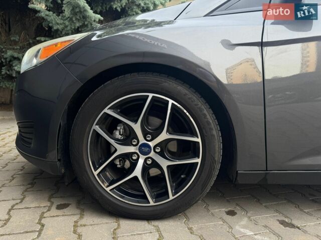 Сірий Форд Фокус, об'ємом двигуна 2 л та пробігом 88 тис. км за 8800 $, фото 14 на Automoto.ua