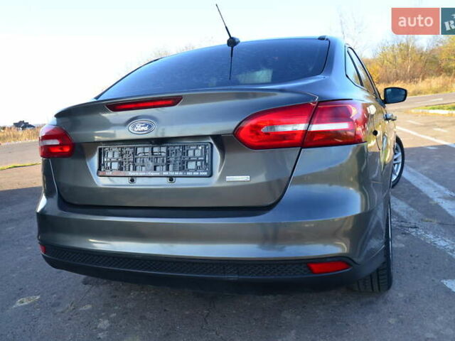 Сірий Форд Фокус, об'ємом двигуна 1 л та пробігом 125 тис. км за 6250 $, фото 30 на Automoto.ua