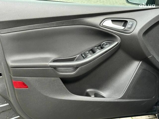 Серый Форд Фокус, объемом двигателя 1 л и пробегом 105 тыс. км за 6990 $, фото 16 на Automoto.ua