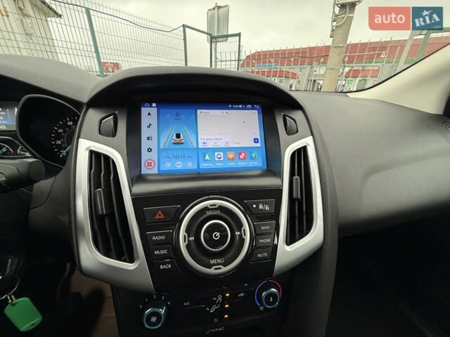 Сірий Форд Фокус, об'ємом двигуна 2 л та пробігом 74 тис. км за 9490 $, фото 17 на Automoto.ua