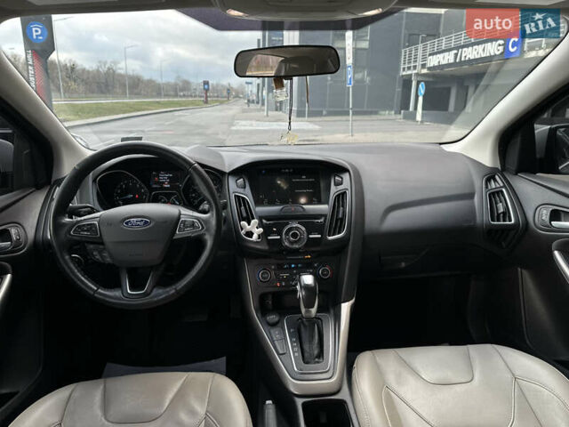 Сірий Форд Фокус, об'ємом двигуна 2 л та пробігом 73 тис. км за 10999 $, фото 11 на Automoto.ua