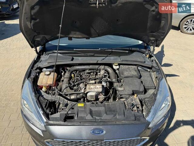 Серый Форд Фокус, объемом двигателя 0.99 л и пробегом 70 тыс. км за 7799 $, фото 4 на Automoto.ua