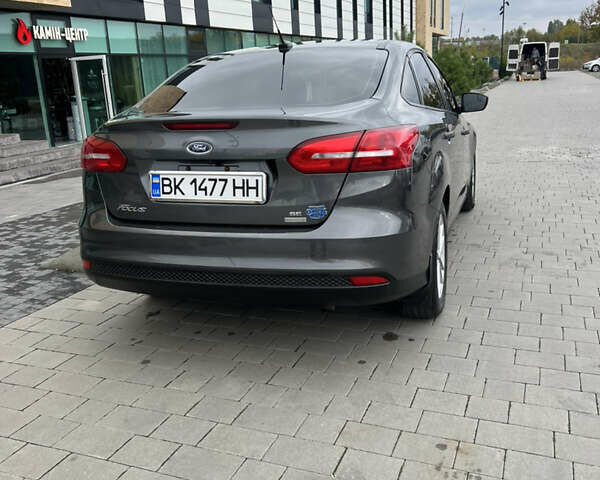 Сірий Форд Фокус, об'ємом двигуна 1 л та пробігом 61 тис. км за 9700 $, фото 4 на Automoto.ua