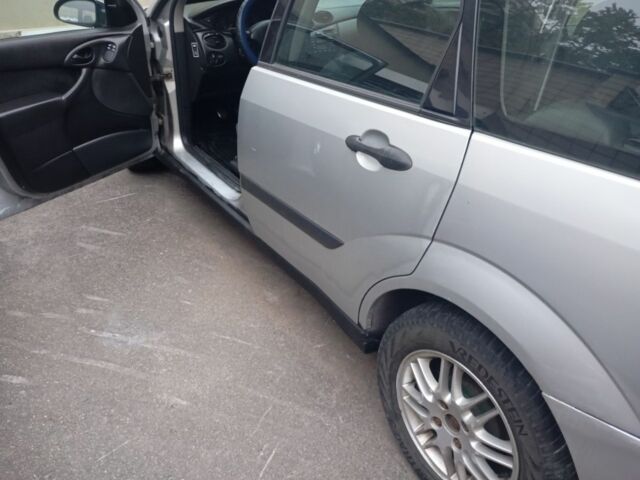 Серый Форд Фокус, объемом двигателя 1.8 л и пробегом 398 тыс. км за 1050 $, фото 4 на Automoto.ua