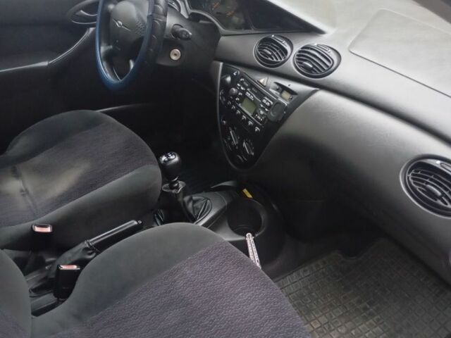 Серый Форд Фокус, объемом двигателя 1.8 л и пробегом 398 тыс. км за 1050 $, фото 11 на Automoto.ua