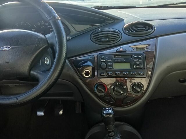 Серый Форд Фокус, объемом двигателя 1.8 л и пробегом 3 тыс. км за 1500 $, фото 4 на Automoto.ua