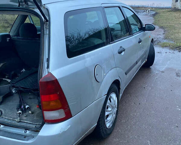 Серый Форд Фокус, объемом двигателя 1.8 л и пробегом 240 тыс. км за 1400 $, фото 3 на Automoto.ua