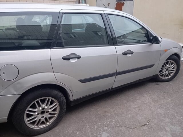 Серый Форд Фокус, объемом двигателя 1.8 л и пробегом 398 тыс. км за 1050 $, фото 1 на Automoto.ua