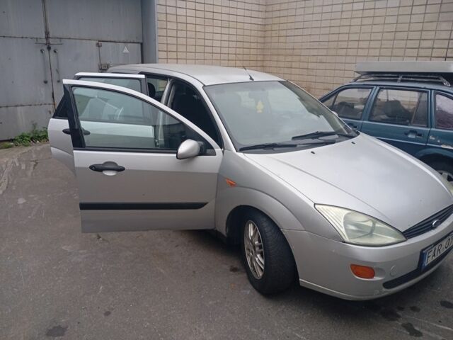 Серый Форд Фокус, объемом двигателя 1.8 л и пробегом 398 тыс. км за 1050 $, фото 6 на Automoto.ua