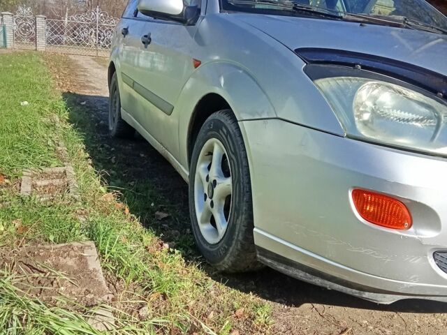 Серый Форд Фокус, объемом двигателя 1.8 л и пробегом 3 тыс. км за 1500 $, фото 5 на Automoto.ua