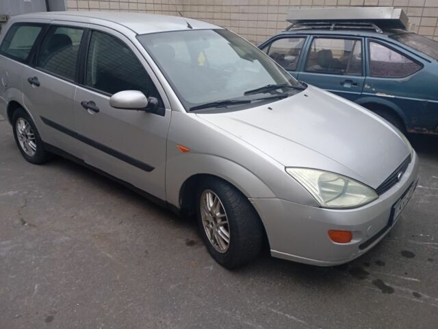 Серый Форд Фокус, объемом двигателя 1.8 л и пробегом 398 тыс. км за 1050 $, фото 2 на Automoto.ua