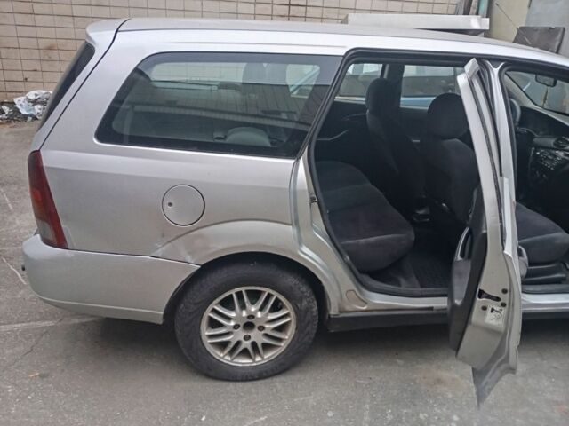 Серый Форд Фокус, объемом двигателя 1.8 л и пробегом 398 тыс. км за 1050 $, фото 9 на Automoto.ua