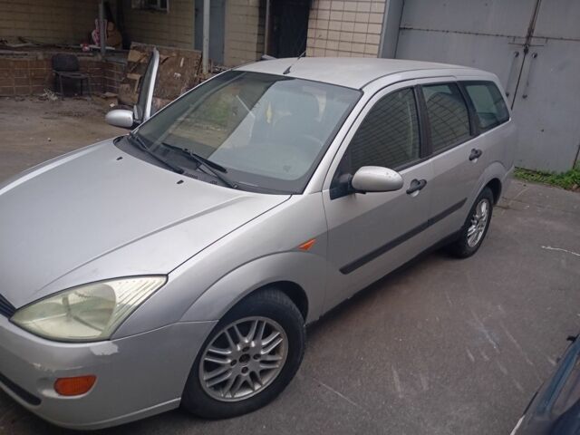 Серый Форд Фокус, объемом двигателя 1.8 л и пробегом 398 тыс. км за 1050 $, фото 7 на Automoto.ua