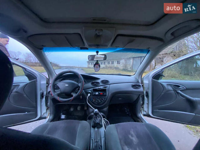 Серый Форд Фокус, объемом двигателя 1.8 л и пробегом 240 тыс. км за 1400 $, фото 15 на Automoto.ua