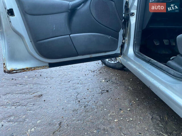 Серый Форд Фокус, объемом двигателя 1.8 л и пробегом 240 тыс. км за 1400 $, фото 12 на Automoto.ua