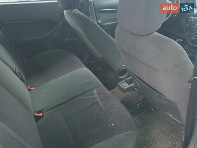 Серый Форд Фокус, объемом двигателя 1.8 л и пробегом 300 тыс. км за 1850 $, фото 6 на Automoto.ua