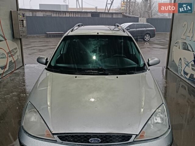 Серый Форд Фокус, объемом двигателя 1.8 л и пробегом 300 тыс. км за 1850 $, фото 5 на Automoto.ua
