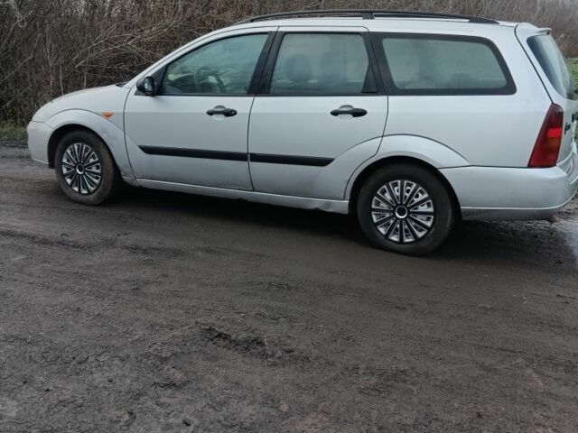 Серый Форд Фокус, объемом двигателя 1.8 л и пробегом 350 тыс. км за 1497 $, фото 6 на Automoto.ua