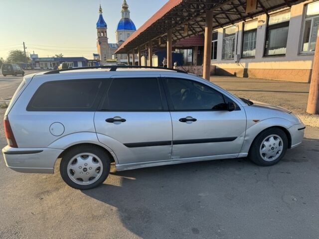 Серый Форд Фокус, объемом двигателя 1.8 л и пробегом 350 тыс. км за 1500 $, фото 3 на Automoto.ua