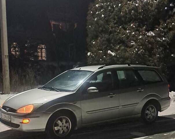 Серый Форд Фокус, объемом двигателя 1.8 л и пробегом 290 тыс. км за 2650 $, фото 3 на Automoto.ua