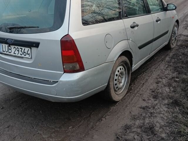 Серый Форд Фокус, объемом двигателя 1.8 л и пробегом 350 тыс. км за 1497 $, фото 2 на Automoto.ua