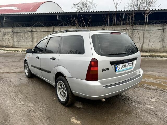 Серый Форд Фокус, объемом двигателя 1.8 л и пробегом 290 тыс. км за 2350 $, фото 1 на Automoto.ua