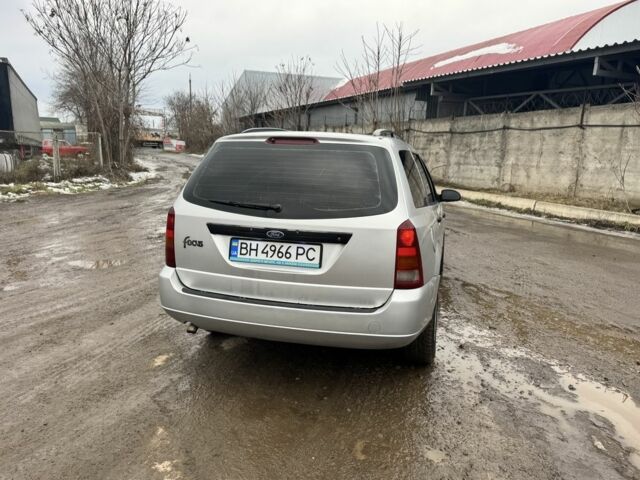 Серый Форд Фокус, объемом двигателя 1.8 л и пробегом 290 тыс. км за 2350 $, фото 3 на Automoto.ua