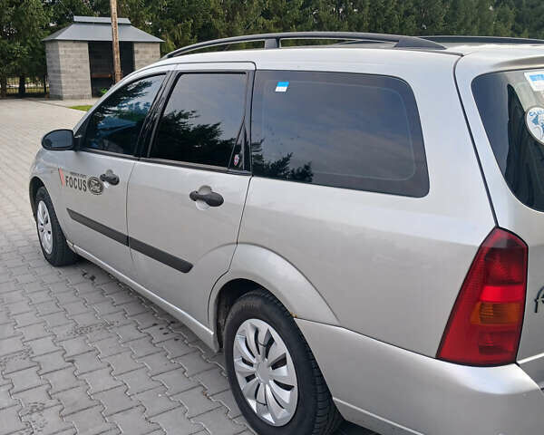 Серый Форд Фокус, объемом двигателя 1.8 л и пробегом 190 тыс. км за 3500 $, фото 2 на Automoto.ua