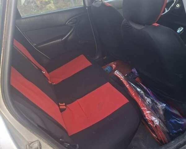 Сірий Форд Фокус, об'ємом двигуна 1.8 л та пробігом 225 тис. км за 2601 $, фото 3 на Automoto.ua