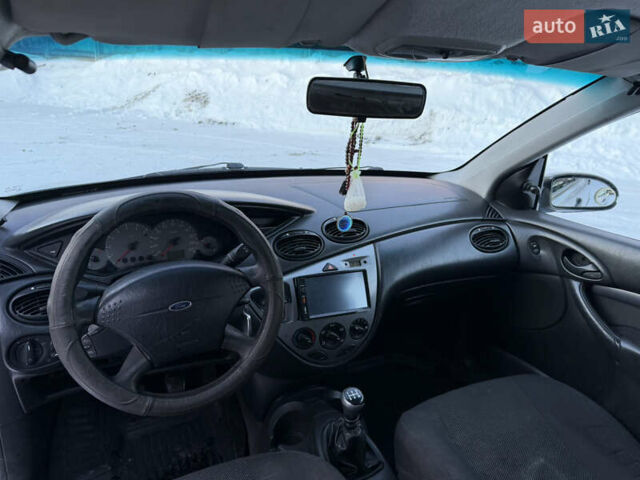 Серый Форд Фокус, объемом двигателя 1.75 л и пробегом 190 тыс. км за 1650 $, фото 4 на Automoto.ua
